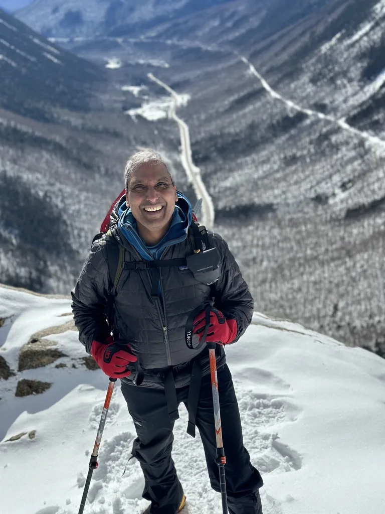 Arul Mahadevan hiking in the mountains